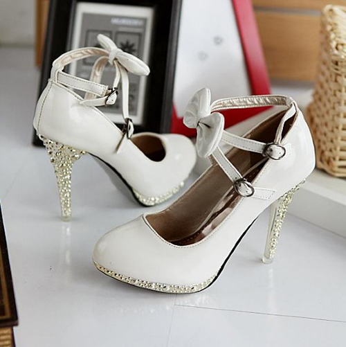 white closed toe heels with strap