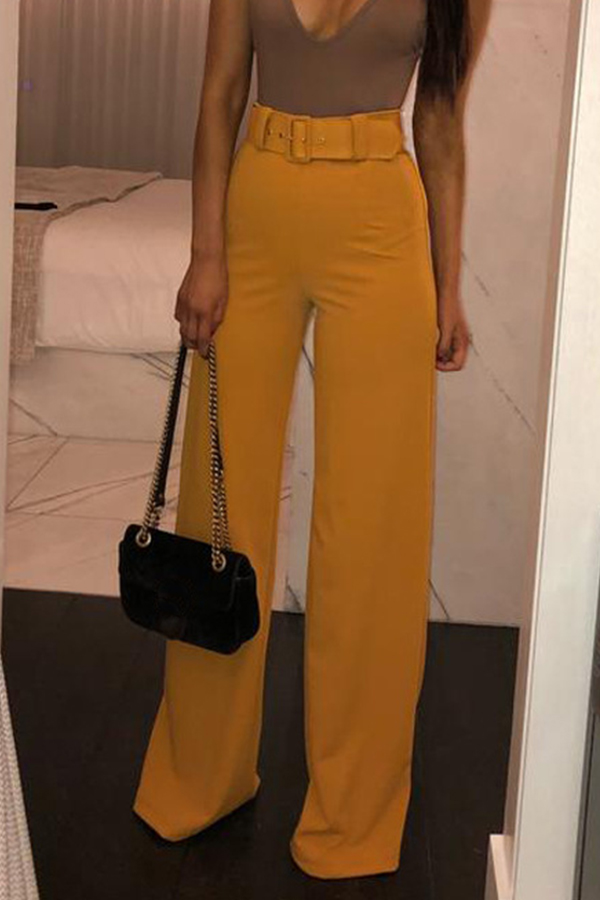 yellow top white pants