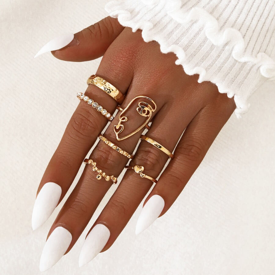 

Lovely Trendy Asymmetrical 7-piece Gold Ring