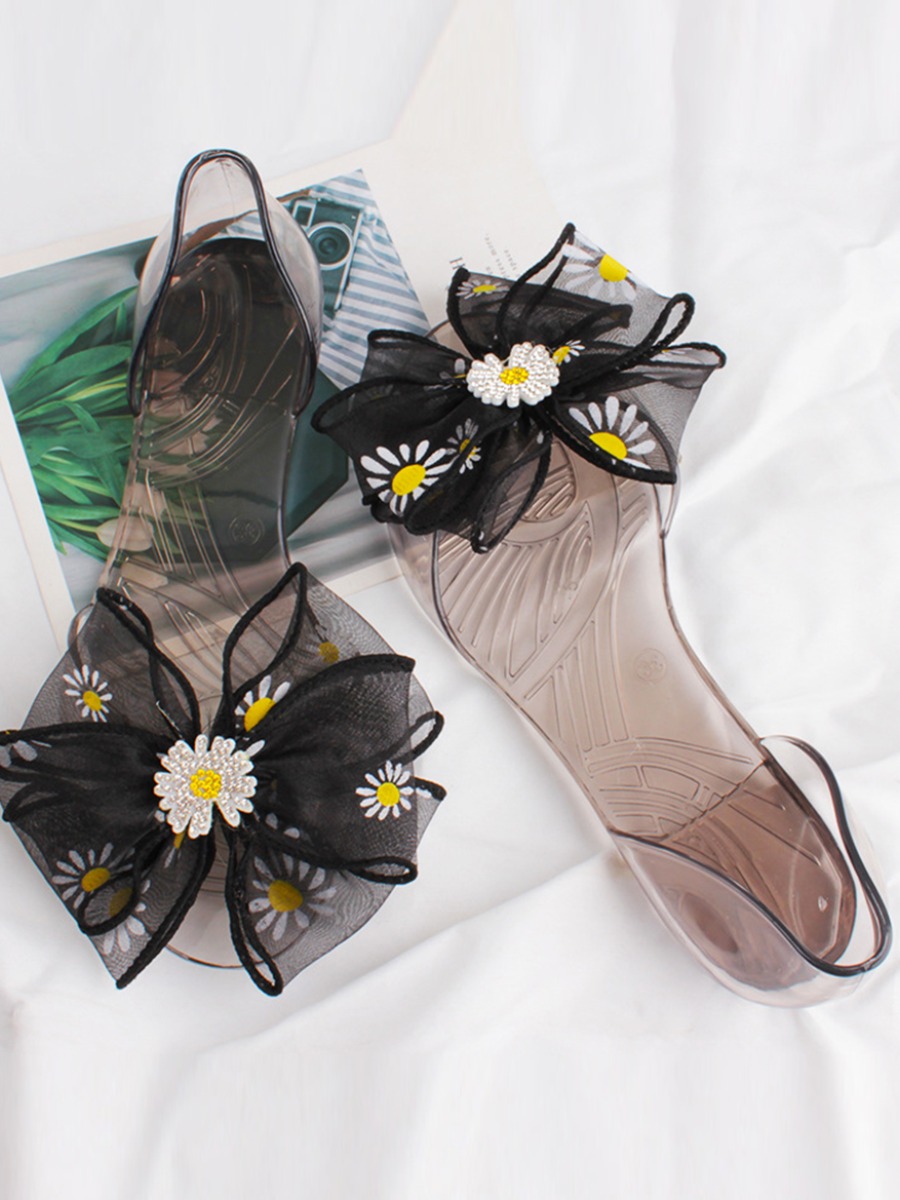 

Lovely Casual Floral Decoration See-through Black Slippers